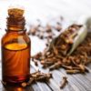 clove-essential-oil-and-glass-bottle