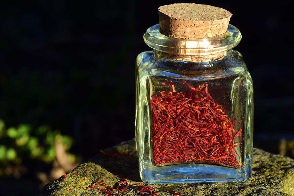 saffron pistils in glass bottle